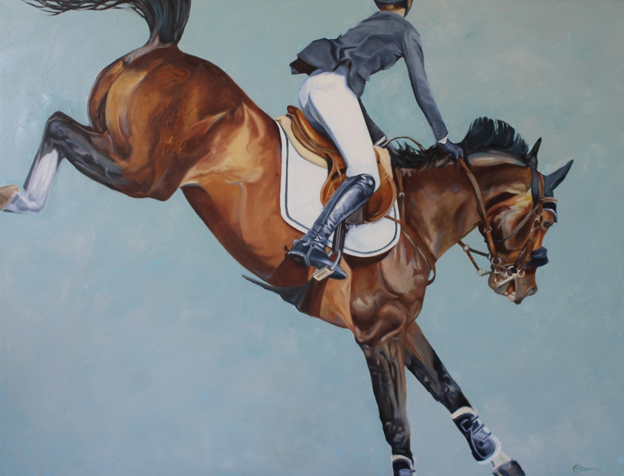 A bay horse and rider landing from a jump with a teal background